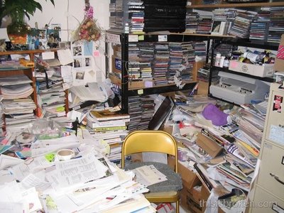Cluttered office needing a commercial cleaning company to help. 